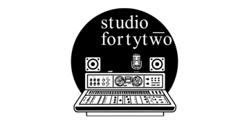 A neon sign in a recording studio that says studio forty two.