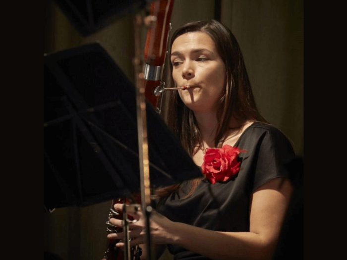 Llinos Owen playing Bassoon on stage.