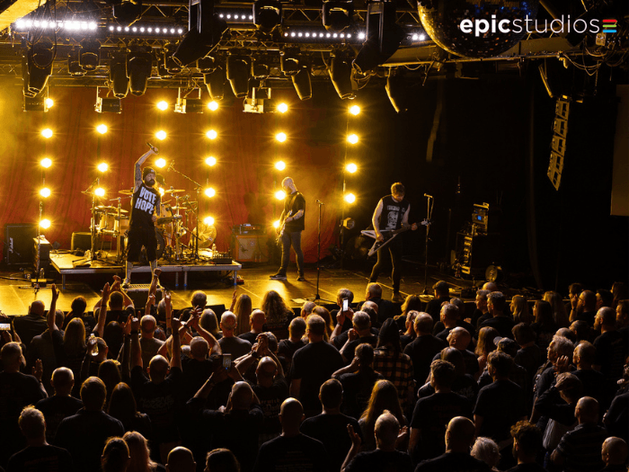 A band onstage, in front of a packed crowd at Epic Studios in Norwich.