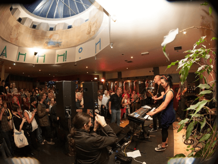 A band playing on stage at the live music venue Mono.