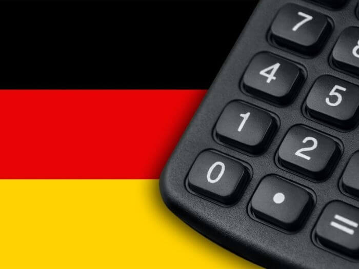 Black calculator and the German flag.