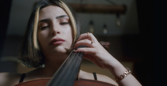 a woman playing cello