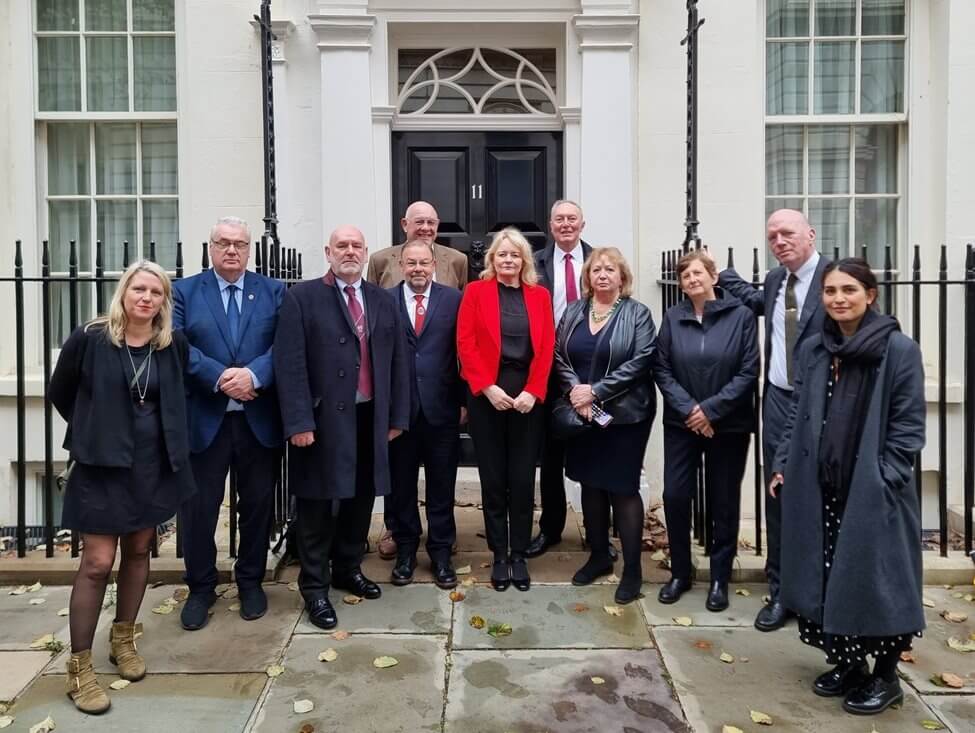 Labour affiliate union general secretaries standing outside 11 Downing Street.