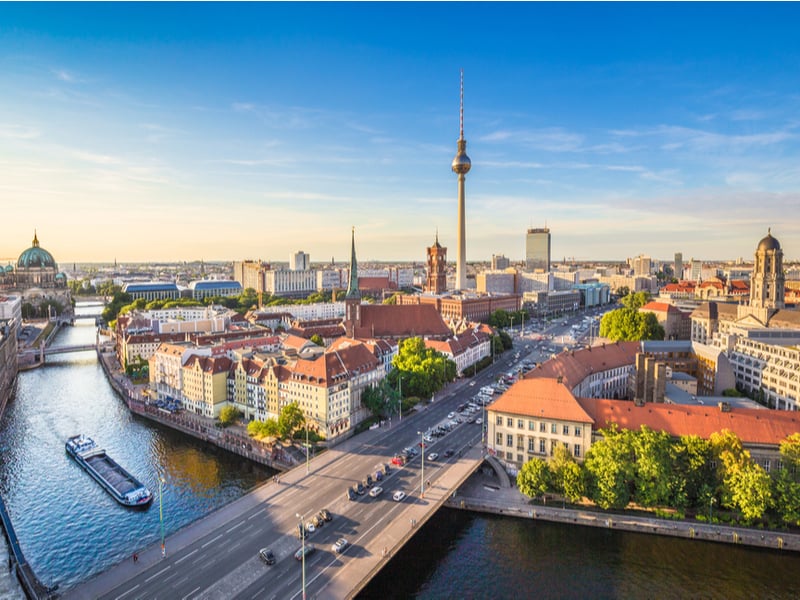 Photograph of the Berlin skyline, in the golden hour.