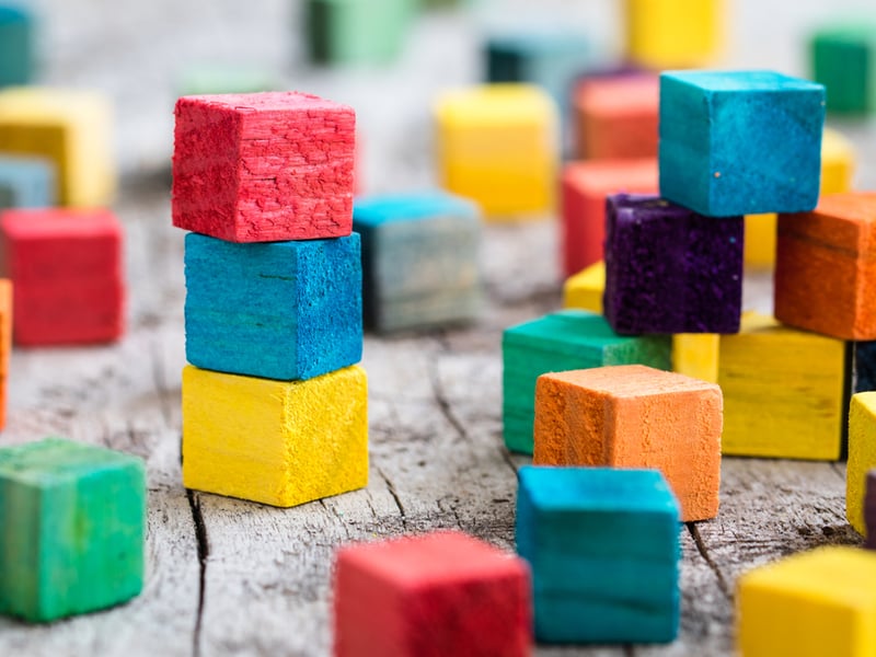 Abstract picture of differently coloured building blocks