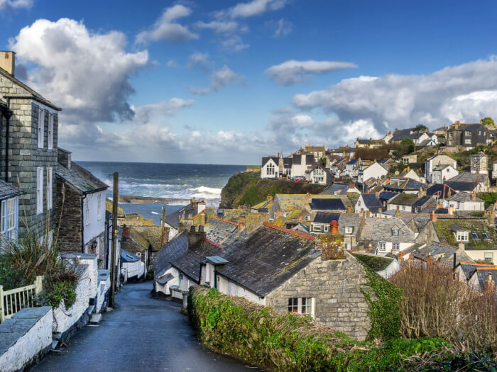 Cornwall village stretches out down a steep hill towards the sea.