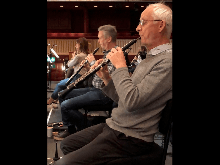 David playing oboe at a rehearsal.
