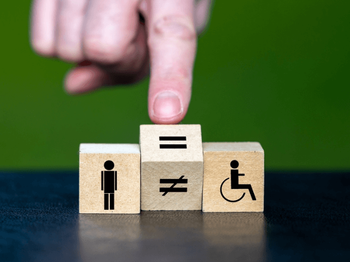 Wooden blocks representing equal rights for disabled people.