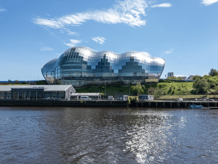 Exterior of the Glasshouse International Centre for Music from the river.