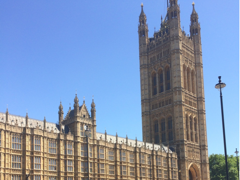 Photograph of the Palace of Westminster under a cold blue January sky.