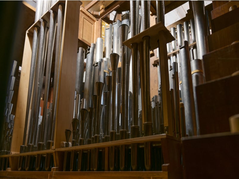 Photograph of the inside of a large pipe organ.