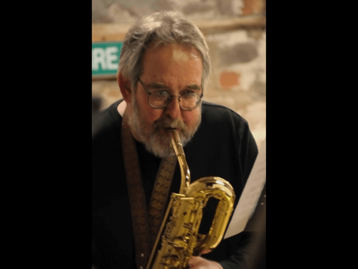 John Williams, playing saxophone.
