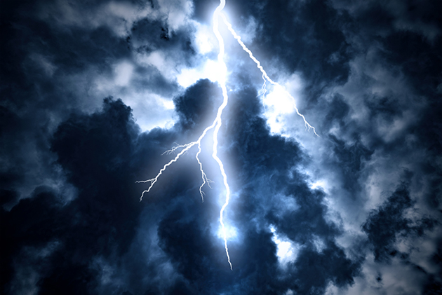 Photograph of lightening strike in a dark stormy sky