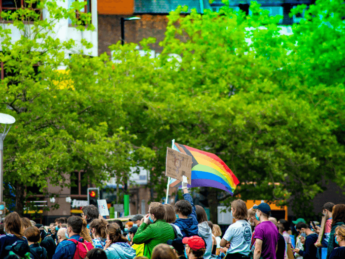 A group of people marching at Manchester Pride.
