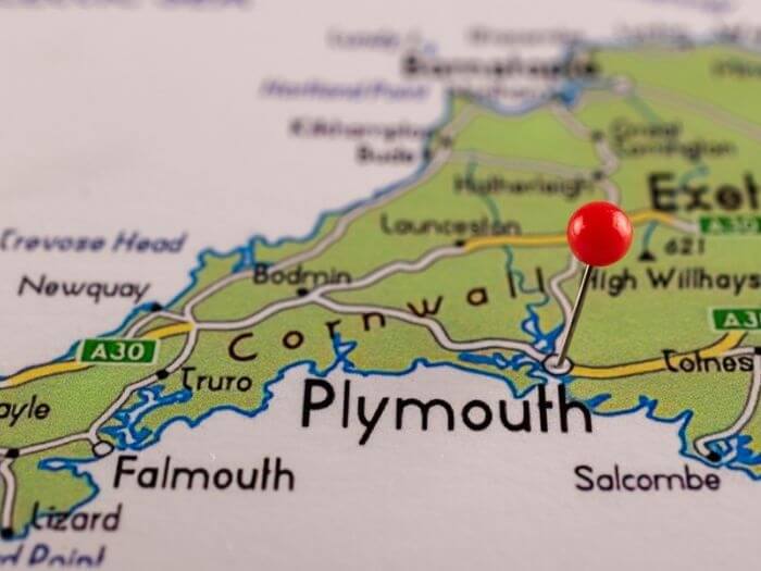 Close up on a map of South West England, a red pin is marking Plymouth.
