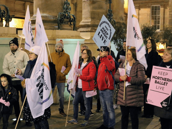 Some of the musicians and supporters from the demo at Newcastle Theatre Royal on 10 November, holding MU banners and signs saying “Keep Northern Ballet Live”.