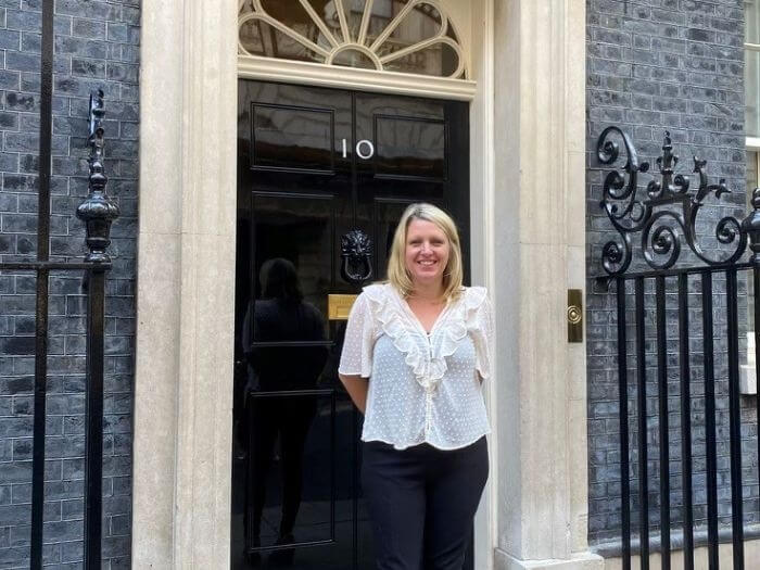 Naomi Pohl standing outside of number 10 Downing Street, after of discussing AI and its impact on music.