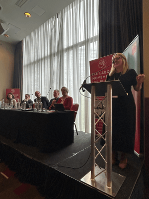 Naomi Pohl speaking on a panel at Labour Conference 2025