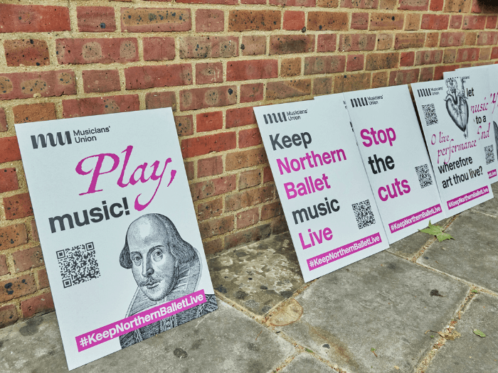 Shakespeare themed campaign placards saying 