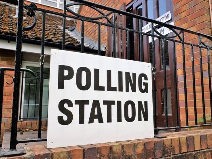 Polling station sign outside a church premises