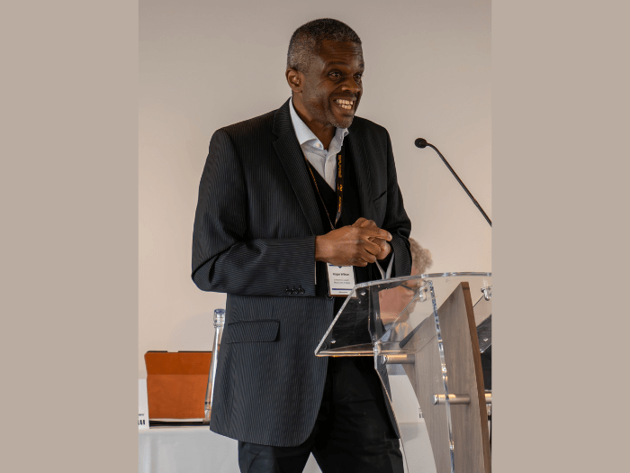 Roger on stage, addressing attendees at MU Delegate Conference 2023.