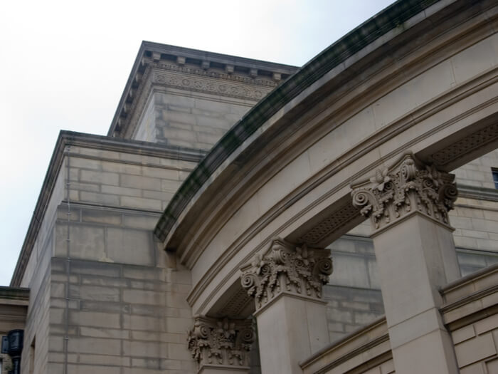 Close up of a corner of Sheffield City Hall, a big white stone building.