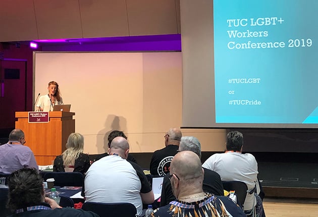 Olive speaking on stage at TUC LGBT+ workers conference 2019