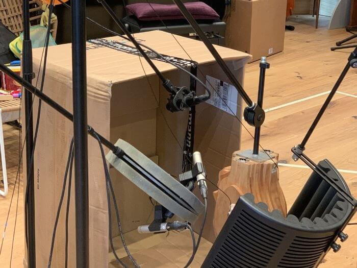 Cardboard box with mics in and around to capture organic sound for the shoe box scene.