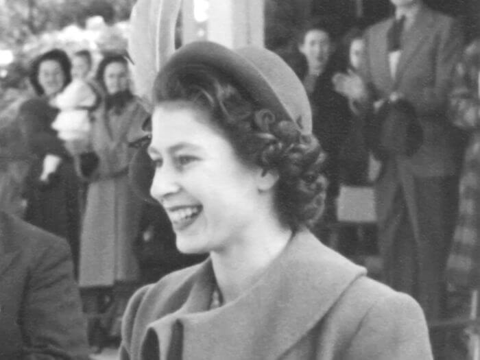 Black and white image of young Queen Elizabeth II.