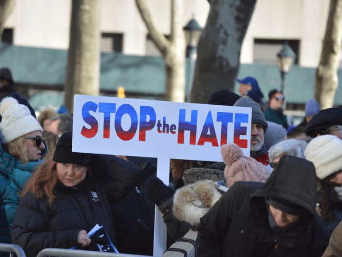 People gathering at a protest against antisemitism.